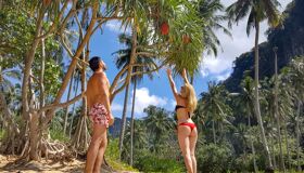 Tourists playing on the Beach in the Southern of Thailand